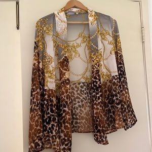 Chico’ travelers sheer duster jacket. Size Large or Chico’s 2